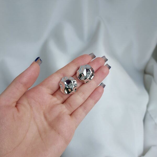 گوشواره دفرمه لاک پشتی